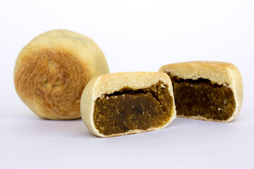 Bakpia pathok , Indonesian Traditional Cake with Chinese Influence. It made from a mixture of green beans, cheese and sugar, which is wrapped in flour, then baked.