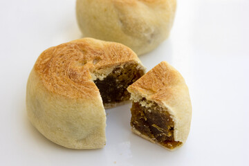 Bakpia pathok , Indonesian Traditional Cake with Chinese Influence. It made from a mixture of green...