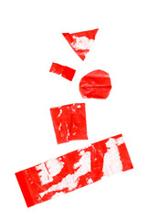 Ripped red tape sticker set with glue residue isolated on white. Torn and used glossy adhesive fragments in geometric shapes