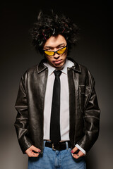 Stylish spring fashion showcase featuring an asian man in a studio setting