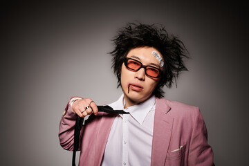 Stylish spring fashion showcase featuring an asian man in a studio setting