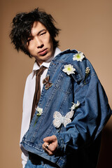Spring fashion showcase featuring a stylish asian man in a creative studio setting
