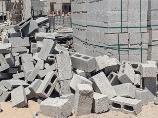 Block or Tabook, Concrete block on construction site, Cement block pallet. Cement bricks for building construction for construct the building and Villa's structure Concrete Cement Block Or Large Brick