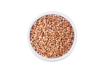 Green buckwheat in a bowl on a white isolated background