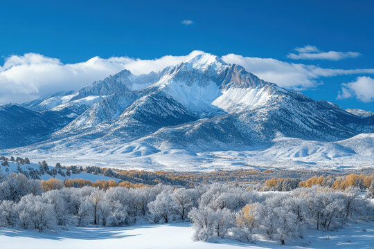 Snowy landscape with towering mountains and dense pine trees. - Powered by Adobe