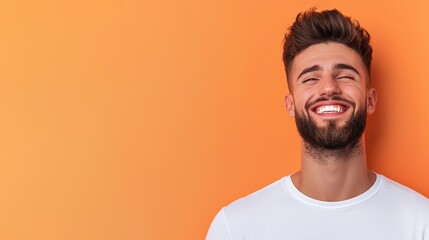 Obraz premium Joy Man smiling broadly after receiving good news, his joy radiating through his expression.