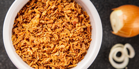 Fried onion crispy onions appetizer vegetables dish fresh delicious gourmet food background on table rustic food top view copy space 