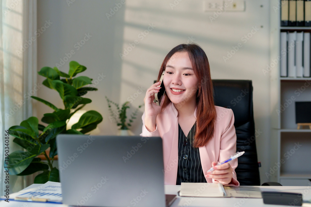 Poster young professional managing business operations remotely, multitasking with phone and computer in a 
