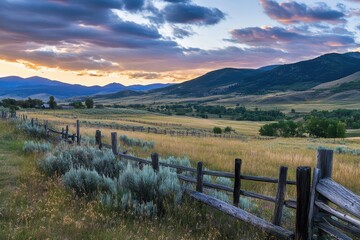 Obraz premium Beautiful Field at Sunrise. Picturesque Countryside Landscape of Fenced Ranch