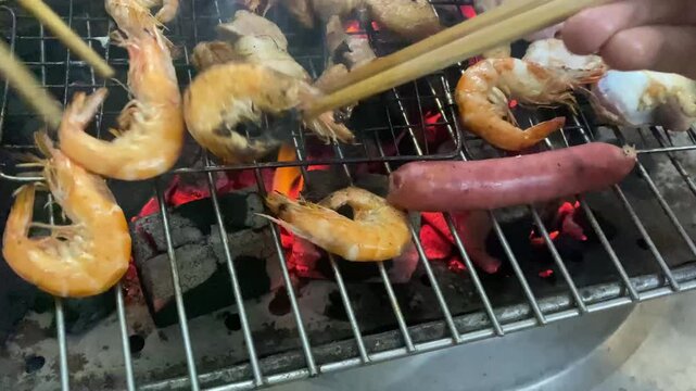 Grilled sausages, grilled chicken gizzards and grilled shrimp