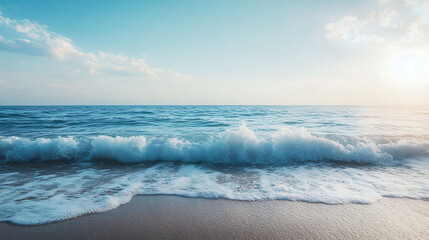 Fototapeta premium Ocean waves crashing on sandy beach at sunset.