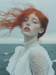 Redhead girl with long hair on the seashore. Beauty, fashion.