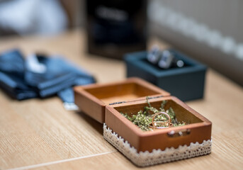 Wooden Box with Wedding Ring and Decorative Background Display
