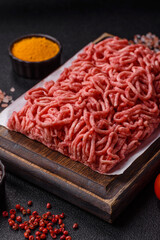 Ground beef mince fresh raw with salt and spices