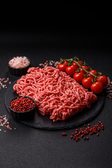 Ground beef mince fresh raw with salt and spices