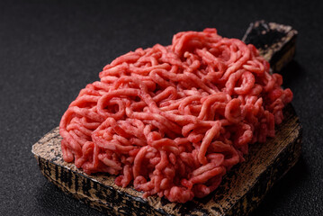 Ground beef mince fresh raw with salt and spices