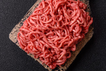 Ground beef mince fresh raw with salt and spices