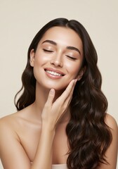 Fototapeta premium A woman gently touching her face with a serene and radiant expression. Her eyes are closed, and she has a gentle smile