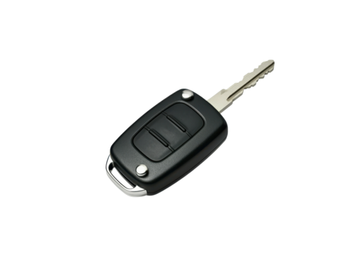 A floating car key with remote buttons, on a solid white background