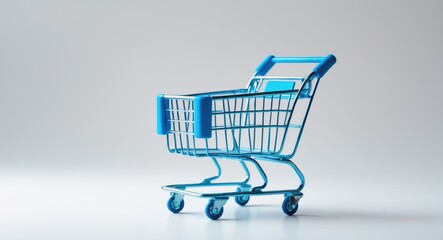 Shopping addiction, shopping enthusiast or shopaholic theme. Isolated blue toy cart against a white background. A cart is a cart provided by stores or supermarkets.