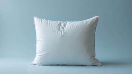 Soft pillow against a colored backdrop.