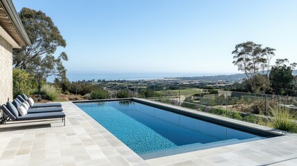 Fototapeta premium Modern infinity pool overlooking stunning coastal view in serene landscape with sunlight and clear blue sky