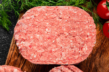 Raw meat cutlet pork beef meat dish organic fresh tasty gourmet food background on the table rustic food top view copy space