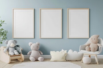 Three frames above stuffed animals and pillows in a baby room with a light blue painted wall