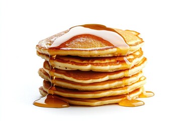 A stack of pancakes with syrup dripping down the sides on a white background in a studio shot