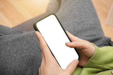 hand holding a mobile phone blanck screen mockup mobile phone blank screen close up.