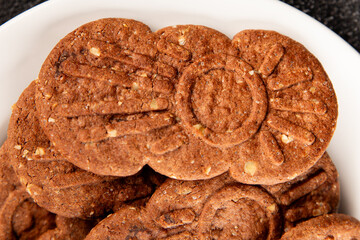 Cookie chocolate nuts sweet cereal dessert organic fresh tasty gourmet food background on the table rustic food top view copy space