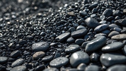Charcoal pebbles or black pebble stones as decorative elements in landscape gardens or parks, ideal for modern contemporary garden flooring.