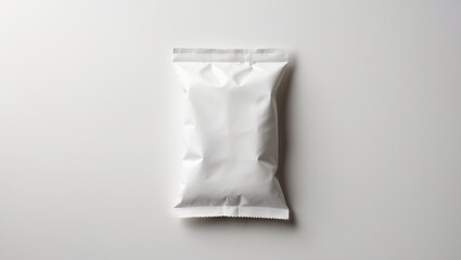 White empty paper pillow snack bag isolated on a white background. Mockup collection of packaging templates. Includes a clipping path. Chips paper package.
