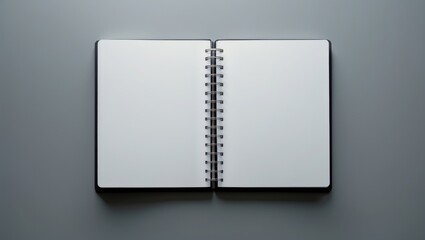 White space inside a black spiral notebook mockup.