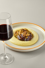 Elegant Presentation of Braised Cheeks with Creamy Potato Puree and Mushroom Sauce