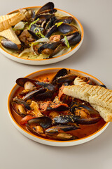 Gourmet Mussels in Creamy Sauce with Artistic Composition and Warm Lighting