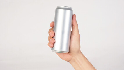 Hand is hold A blank silver aluminum can on white background.