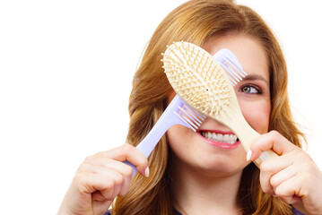 Girl long hair with comb brush