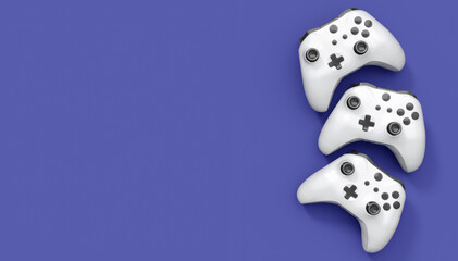 Realistic white video game joysticks or gamepads on violet background © Vasyl Onyskiv