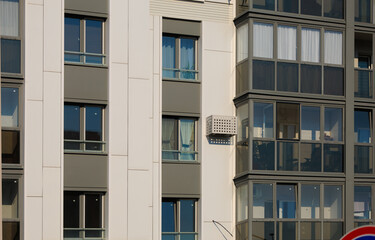 Fototapeta premium Cityscape on a summer day, modern buildings and houses 