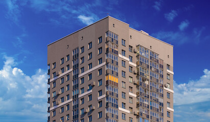 Fototapeta premium City view on a sunny day. Modern houses against the blue sky.