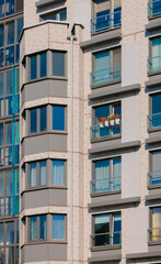 Cityscape on a summer day, modern buildings and houses 