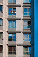 Cityscape on a summer day, modern buildings and houses 