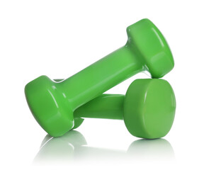 Green dumbbells isolated on white. Sports equipment