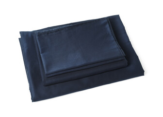 Stack of silky bed linens on white background