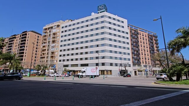 Valencia, Spain - 7 April 2025 , Modern Cityscape of Valencia, Spain Featuring AC Hotel by Marriott on a Sunny Day