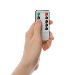 Fototapeta premium Woman with modern lighting remote control on white background, closeup