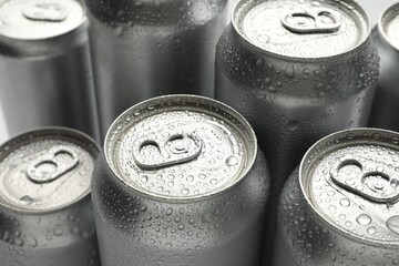 Many different tin cans as background, closeup