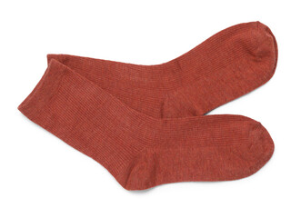Pair of reddish brown socks isolated on white, top view