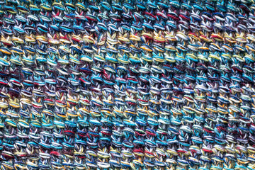 Obraz premium Colorful woven pattern with textured yarns for crafting and decoration